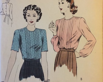 VTG 9329 Vogue (1942). Misses' blouse. Size 14, Bust 32". Complete, unused, FF. Excellent condition.