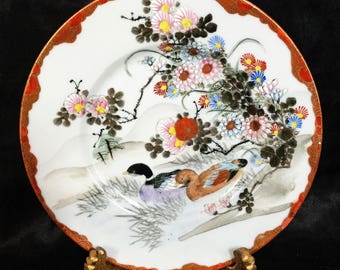 A beautiful Meiji period, porcelain plate