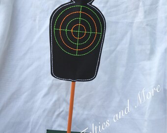 dart gun and target