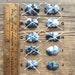 Little pairs of dendritic agate freeform rosecut cabochons, merlinite
