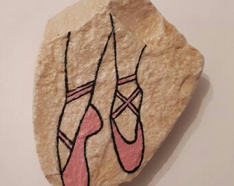 Pointe shoes on a stone