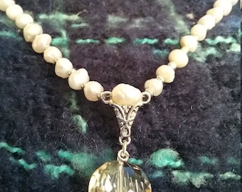 Cultured pearl necklace with Smoky Quartz pendant.