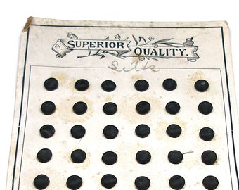 Antique Petite Silk BUTTONS, 71 Victorian Black silk, unused on original card, 1/3". Pad back.
