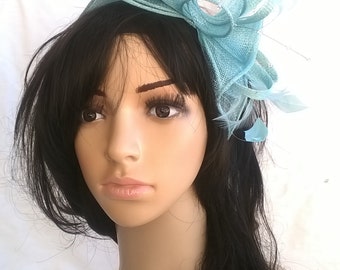 Aqua rosette fascinator ..on a headband ..Stunning for races ,wedding.