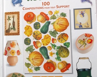 creative book with papers of decorated 100 compositions for support