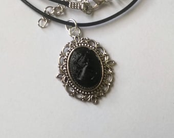 Handmade silver colored necklace with cameo made out of coal