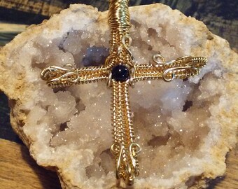 Gold wire wrapped cross pendant