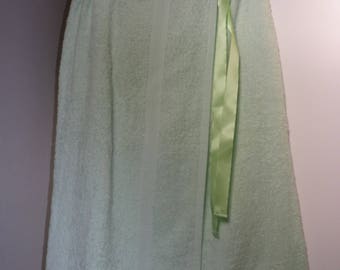 Exit of baths in green terry cloth. .