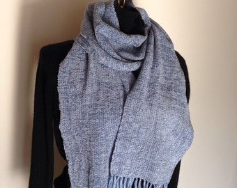This handwoven rayon chenille scarf is pale blue.
