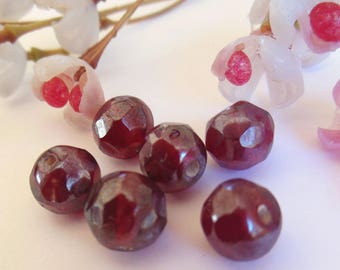 set of 12 round faceted red glass beads