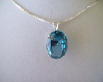 Lab Grown Aquamarine Pendant in Sterling Silver with chain 16x12mm