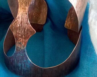 Copper bracelet with pierced hearts