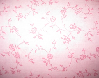 100 percent cotton fabric/pink with darker pink flowers and vines/quilting/crafts/apparel/by the yard