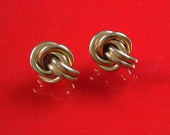 Gold tone twisted clip-on earrings