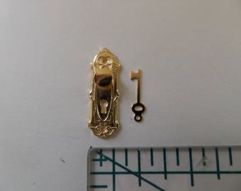 Brass Embossed door handle with backplate and Key for a 1:12th scale Dolls House