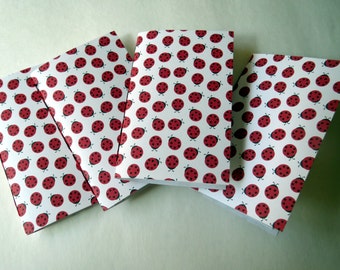 Mini Ladybug Notebooks, red, black, and white, stitched journal 4 count. Perfect for pockets.
