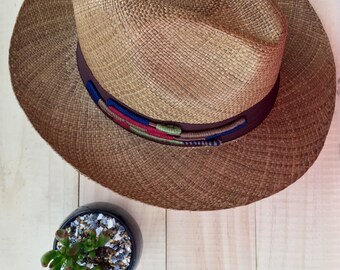 Type Panama Hat, woven with Toquilla straw and applique in neutral colors.