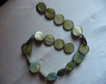 Beads, Mother of Pearl 20mm Flat Round Coin, Shades of Green. Sold per 15 inch strand. There are 20 beads on the strand.