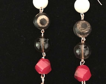 Earrings made with a beautiful assortment of beads (agate, quartz, and glass)