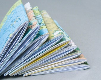 5 mini notebooks made with eco paper that is recycled, rescued, post-consumer, and found