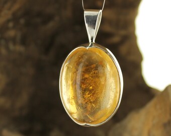Citrine and silver pendant. Natural stone.