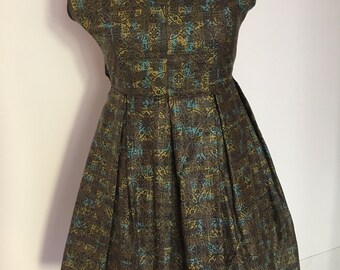Olive green dress with pleated skirt