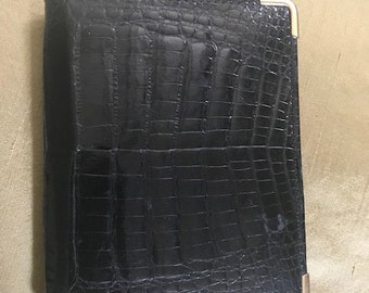 Elegant patent snakeskin cardholder with gold tipped corners
