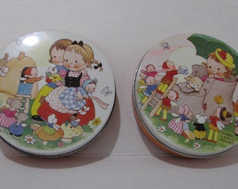 Two little Huntley & Palmer Biscuit tins made for children