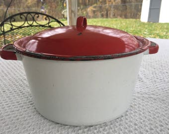 Red and white enamel pan with lid