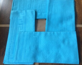 Four Damask Napkinsin Bermuda Blue