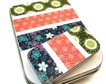Large hinge tin and Small slide tin Duo. . . Flowers. Great for beading projects.