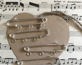 Decorative brooch nourisse pins