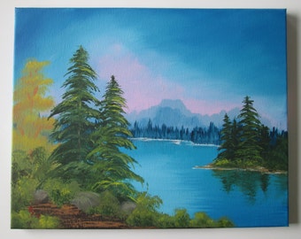 Acrylic painting of lake and trees with far off mountains sunrise sky