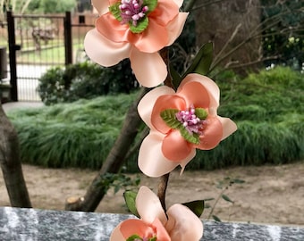 Ceramic jar made with short coffee with peach blossoms