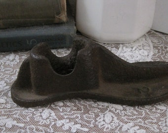 vintage cobbler children's wrought iron metal shoe form