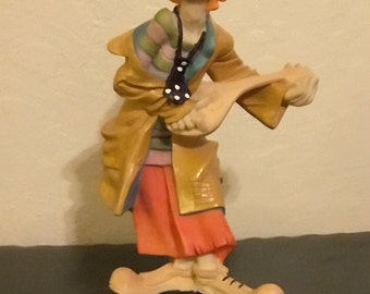 Clown Figure playing Mandolin