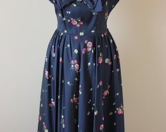 1950s navy blue floral dress with light pink chiffon pleated neckline