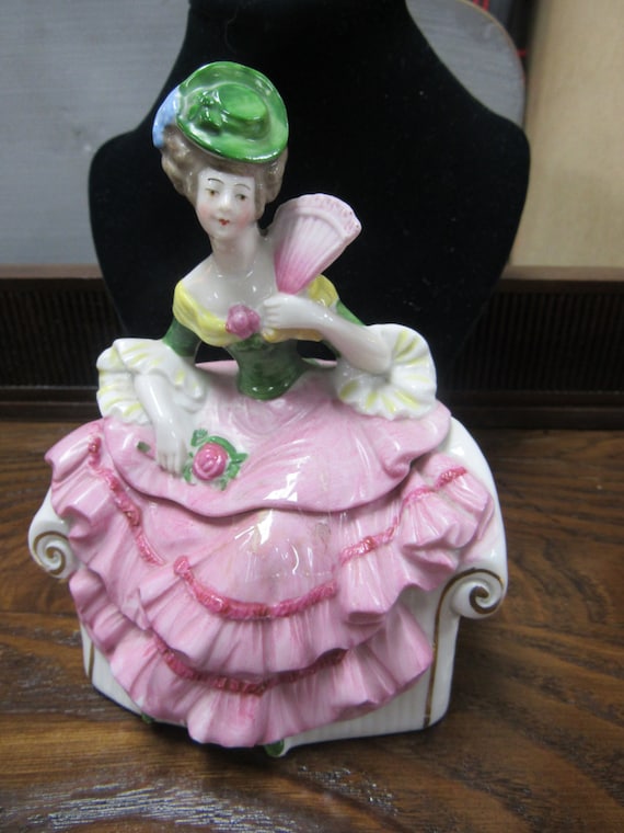 Figural lady vanity jar seated holding fan two piece