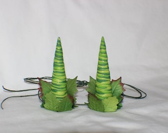 Green twisted leafy horns