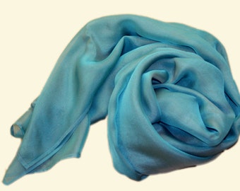 silk scarf iridescenting in turquoise and taupe