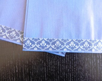 40 blue pockets decorated measuring 12 X 20 CM