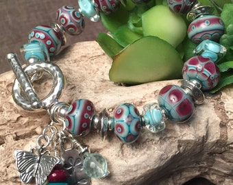 RASPBERRY ICE, artisan lampwork and sterling silver bracelet