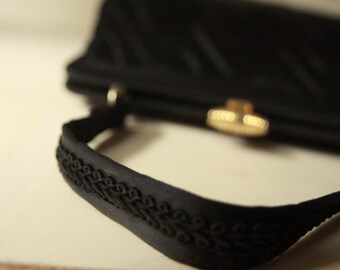 1950s black fabric evening handbag, vintage 50s handbag, folded fabric.