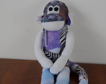 Zebra print sock monkey, zebra sock monkey, purple sock monkey