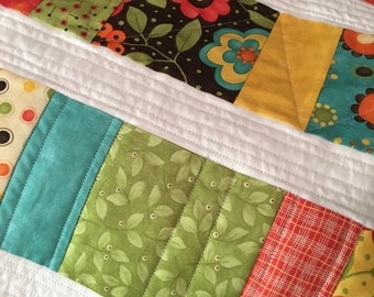 Baby quilt -- small stroller quilt -- pieced and quilted on a home sewing machine