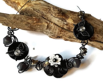 The Choker necklace made of aluminum and black beads