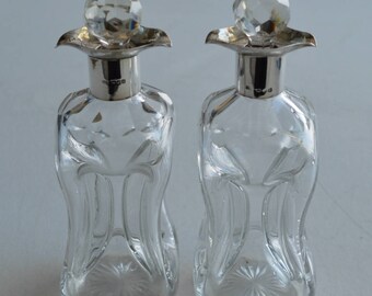 A Pair of 19th C. Liquor Decanters with Silver Top, London 1899