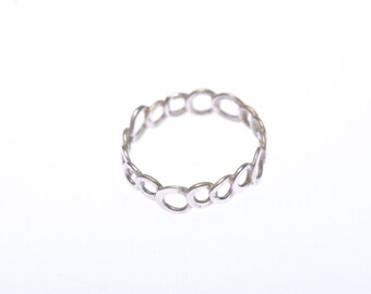 Open form delicate silver ring