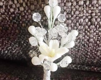 Wedding Boutonniere with orange blossoms