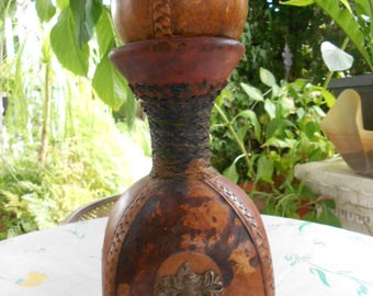 RARE vintage Original M A Leather covered green glass wine Decanter/Made in Italy/the same court of arm on four sides.